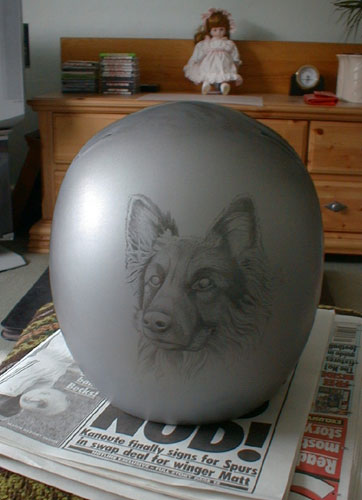 Drawing of old dog on helmet